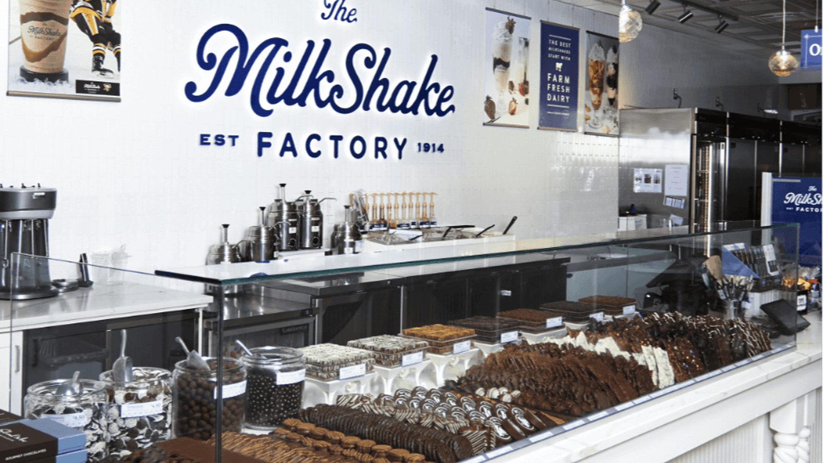The interior of a Milkshake Factory store with a selection of chocolate treats.